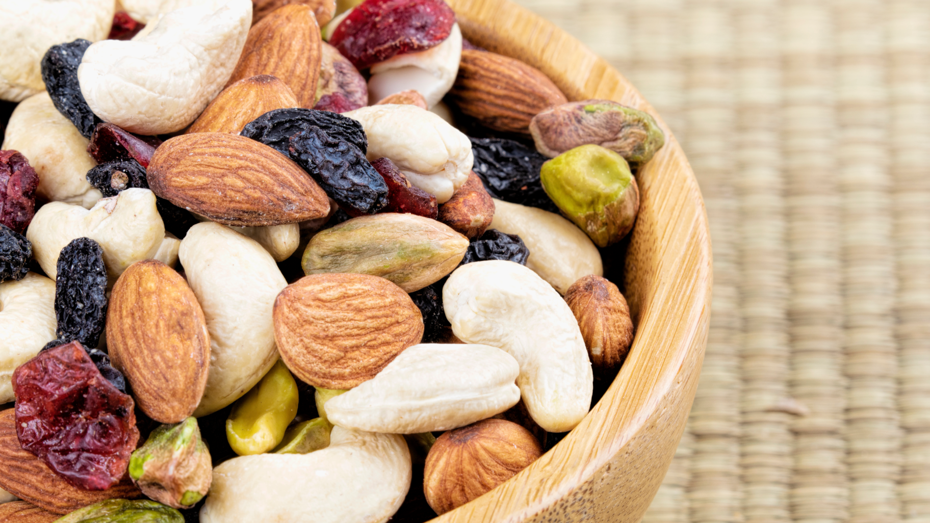 A variety of nuts, including almonds, walnuts, and hazelnuts, displayed together as a healthy snack or ingredient.