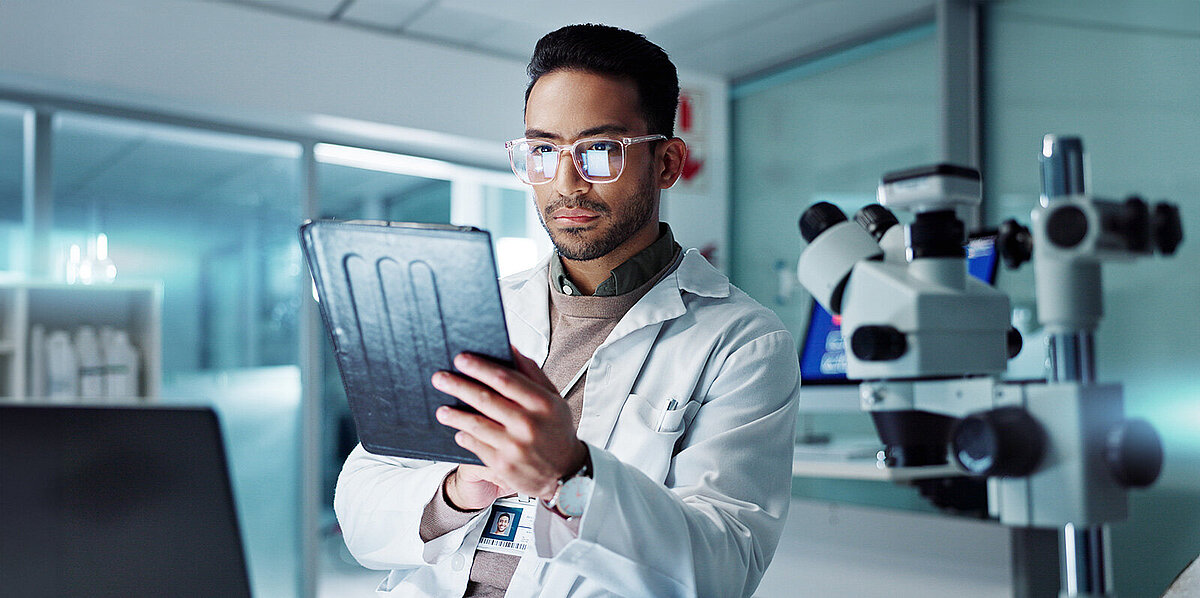 Doctor looking at a tablet