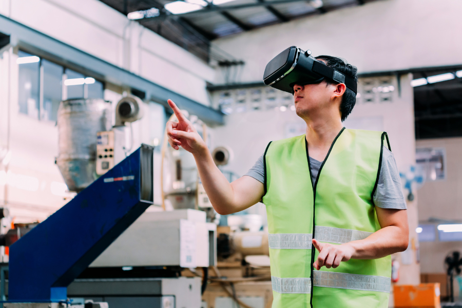 a person wearing a vr headset in a factory